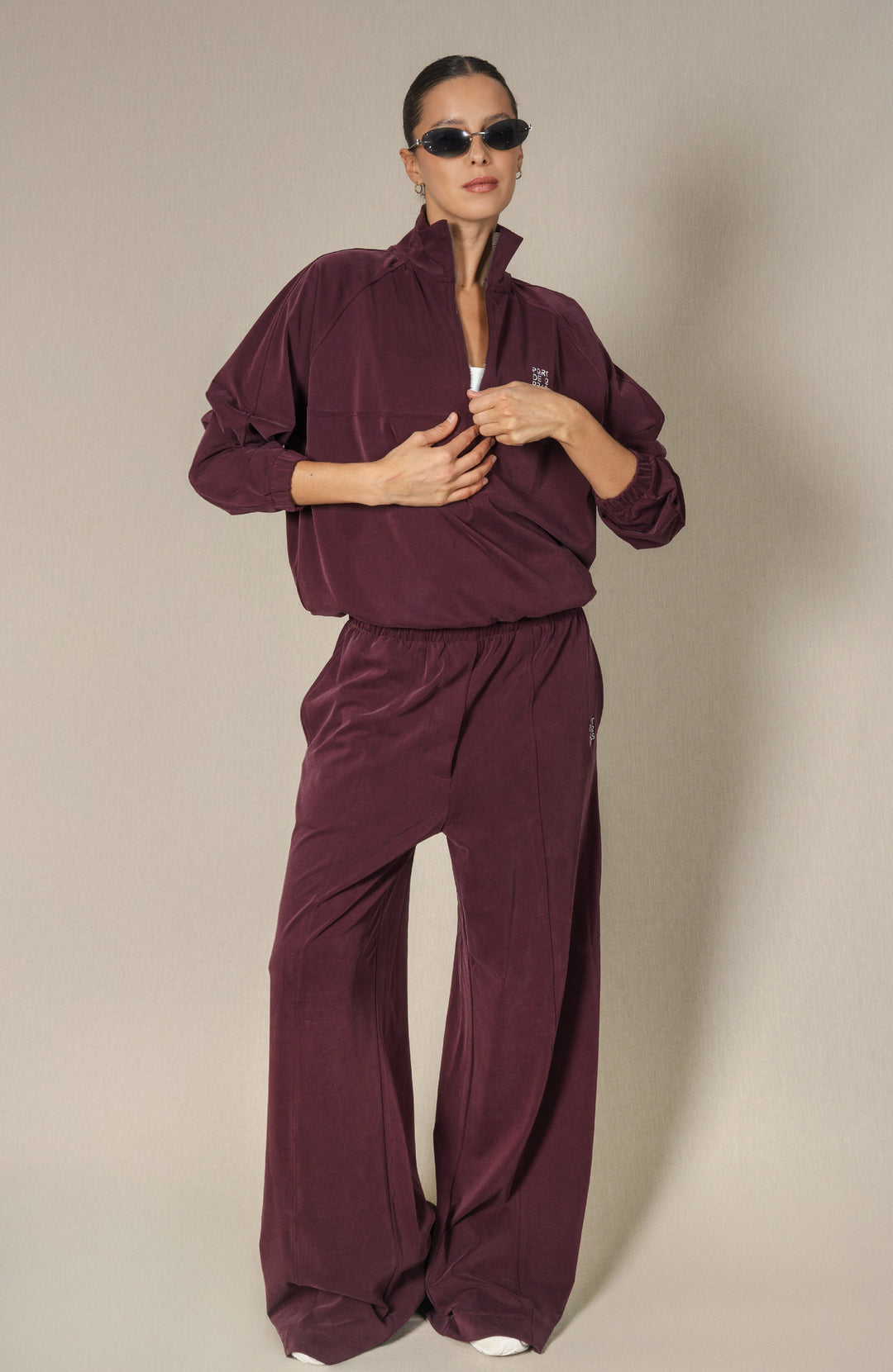 Port de Bras: burgundy velvet jacket and flowing matching trousers
